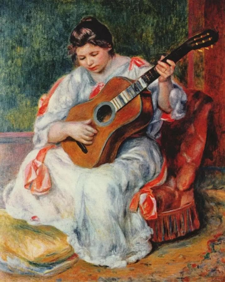 Женщина, играющая на гитаре